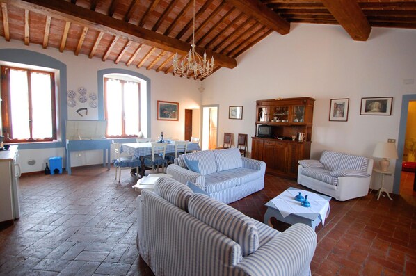 The living room at Pinolo is spacious and luminous