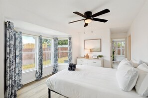 Wake up to the soft glow of the tranquil sunrise. With four windows in this bedroom, there’s plenty of natural light to usher in the new day!