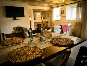 Sitting/dining room with table for four
