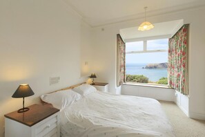 Bedroom with sea view from window