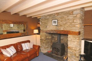 Comfy sofa with wood burner & 32" TV