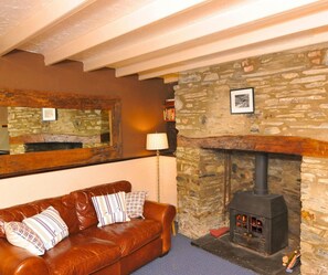 Comfy sofa with wood burner & 32" TV