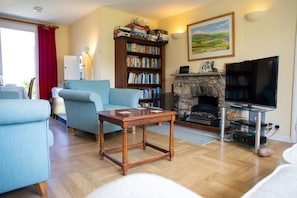 Sitting area with sofa and TV