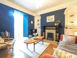 Large bay window. Traditional feature fire place
