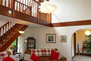 Stairs leading from the living room to the first floor