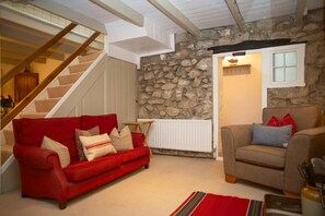 Lounge with sofa and armchair