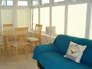 Dining table and chairs, sofa