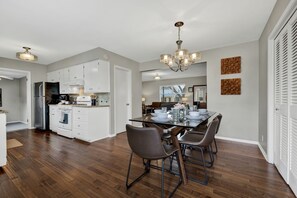 Open concept dining and kitchen space.