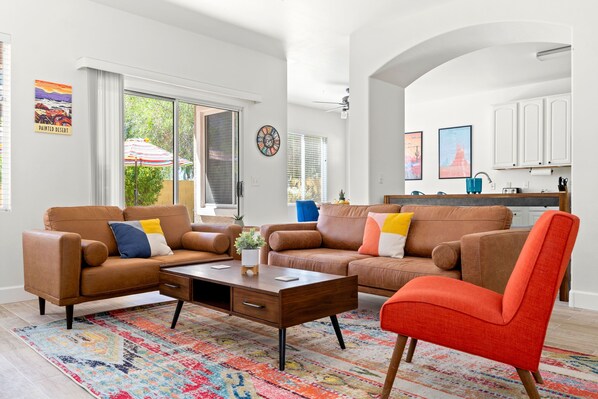 Step into the cozy and colorful living room sanctuary created for relaxation.