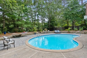 Bask in the sun by the 33` x 18` pool