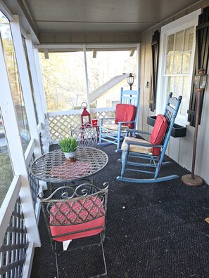 Enjoy the summer breeze with the screened in porch.