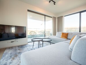 Couch, Furniture, Window, Comfort, Wood, Building, Interior Design, Shade, Living Room, Table