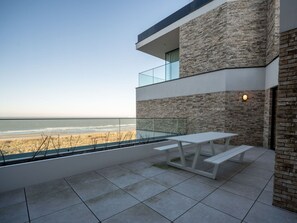 Building, Water, Sky, Shade, Outdoor Furniture, Wall, Urban Design, Real Estate, Rectangle, Roof