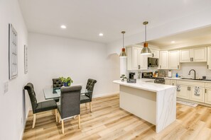 Kitchen & Dining Area | In-Unit Laundry | Self Check-In