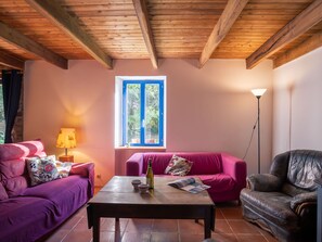 Couch, Furniture, Property, Table, Comfort, Purple, Wood, Window, Flooring, Interior Design