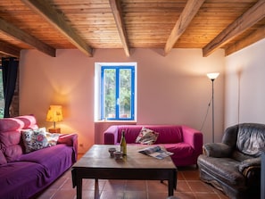Couch, Furniture, Property, Table, Comfort, Purple, Wood, Window, Flooring, Interior Design
