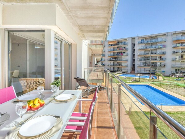 Table, Furniture, Window, Building, Chair, Azure, Tableware, Couch, Plant, Swimming Pool