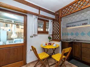 Cabinetry, Furniture, Property, Countertop, Chair, Kitchen, Table, Wood, Building, Interior Design