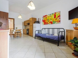 Furniture, Houseplant, Interior Design, Plant, Comfort, Lighting, Picture Frame, Floor, Living Room, Decoration