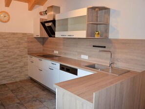Countertop, Cabinetry, Property, Furniture, Sink, Tap, Kitchen Sink, Kitchen, Building, Wood
