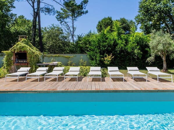 Plant, Sky, Building, Water, Tree, Outdoor Furniture, Rectangle, Shade, Swimming Pool, Leisure