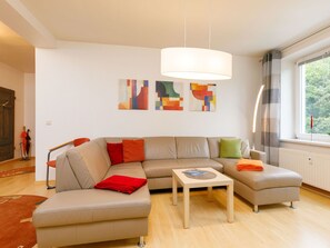 Couch, Furniture, Window, Comfort, Wood, Orange, Interior Design, Flooring, Living Room, Studio Couch