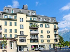 Building, Sky, Window, Cloud, Condominium, Urban Design, Tree, Wheel, Material Property, Residential Area