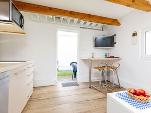 Cabinetry, Property, Furniture, Wood, Table, Interior Design, Lighting, Flooring, Kitchen