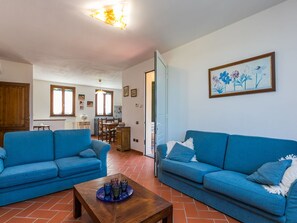 Couch, Table, Furniture, Property, Picture Frame, Blue, Azure, Interior Design, Studio Couch, Living Room