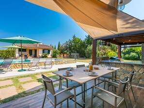Sky, Table, Furniture, Property, Chair, Shade, Outdoor Furniture, Outdoor Table, Leisure, Flowerpot