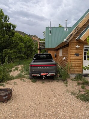 Charge your EV with our Rivian charger. NOTE-- Tesla owners will need to bring their own adapter.