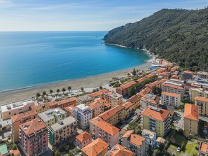 Water, Sky, Water Resources, Building, Azure, Plant, Beach, Coastal And Oceanic Landforms, Cloud, Tree