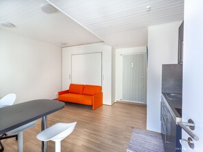 Furniture, Table, Property, Comfort, Couch, Wood, Interior Design, Living Room, Building, Flooring