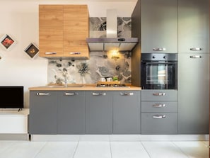 Countertop, Cabinetry, Property, Furniture, Kitchen, Drawer, Kitchen Stove, Kitchen Appliance, Home Appliance, Wood