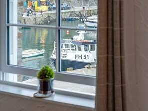 Plant, Boat, Window, Water, Flowerpot, Watercraft, Houseplant, Vehicle, Naval Architecture, Building