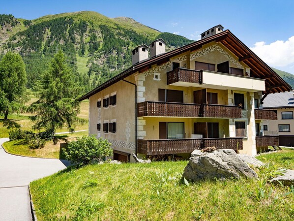 Plant, Building, Sky, Property, Window, Cloud, Mountain, House, Tree, Land Lot