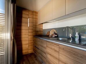 Countertop, Cabinetry, Tap, Sink, Kitchen Sink, Wood, Interior Design, Kitchen, Plumbing Fixture, Floor