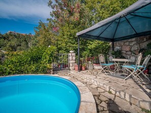 Water, Plant, Building, Azure, Sky, Swimming Pool, Shade, Outdoor Furniture, Tree, Leisure