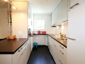Cabinetry, Countertop, Kitchen, Sink, Drawer, Kitchen Appliance, Wood, Floor, Flooring