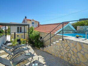 Sky, Building, Window, Plant, House, Water, Shade, Urban Design, Outdoor Furniture, Cottage