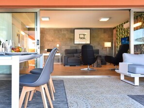 Furniture, Interior Design, Lighting, Couch, Chair, Comfort, Living Room, Flooring, Table, Real Estate