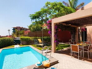 Plant, Sky, Water, Property, Building, Tree, Chair, Outdoor Furniture, Shade, Swimming Pool