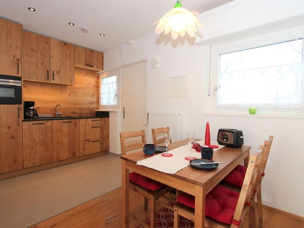 Property, Furniture, Table, Cabinetry, Window, Wood, Lighting, Interior Design, Flooring, Floor