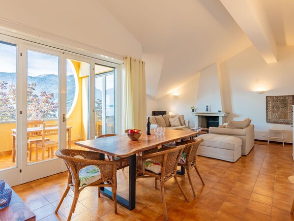 Sky, Building, Property, Table, Furniture, Cloud, Mountain, Interior Design, Outdoor Furniture, Wood