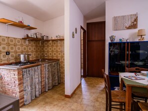 Furniture, Cabinetry, Property, Wood, Table, Interior Design, Shelving, Floor, Kitchen, Flooring