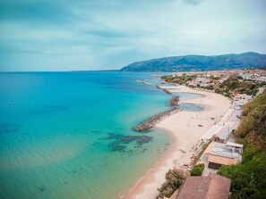 Water, Cloud, Sky, Plant, Azure, Beach, Coastal And Oceanic Landforms, Terrain, Tree, Horizon
