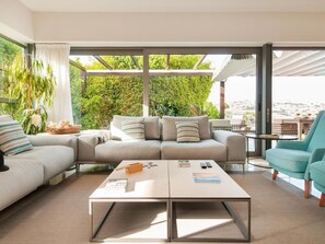 Couch, Furniture, Property, Table, Plant, Interior Design, Lighting, Studio Couch, Living Room, Comfort