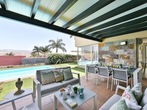 Property, Furniture, Couch, Plant, Shade, Table, Interior Design, Living Room, Lighting, Outdoor Furniture