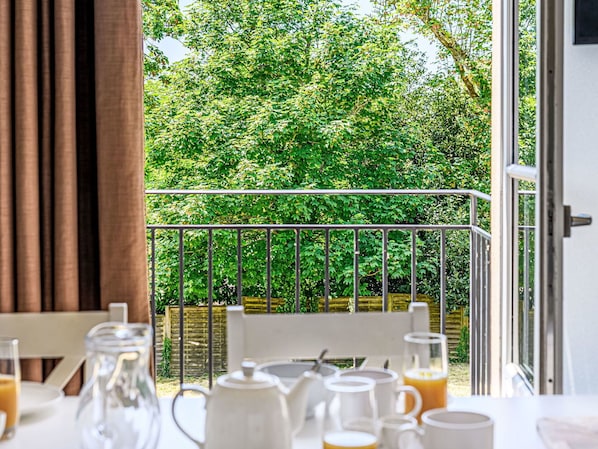 Furniture, Chair, Interior Design, Glass, Kitchen & Dining Room Table, Eco Hotel, Outdoor Furniture, Shade, Balcony, Wood Stain