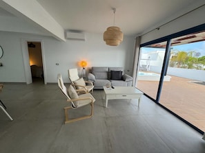 Chair, Building, Wood, Lighting, Interior Design, Table, Shade, Couch, Living Room